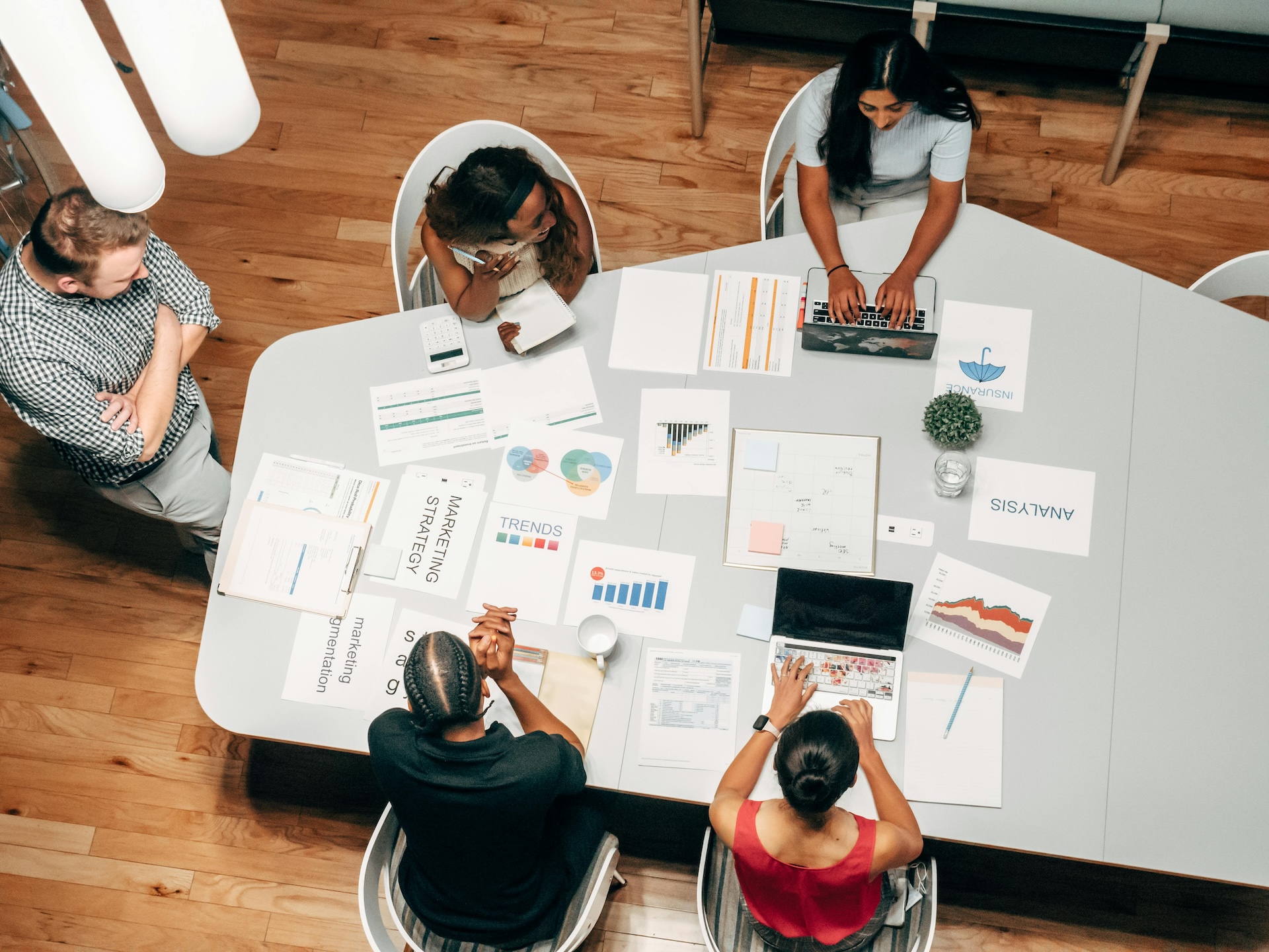 Group of people working together at a table